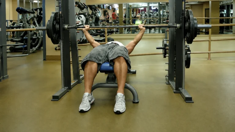 Jason Faulkner performing a decline bench press on a Smith machine
