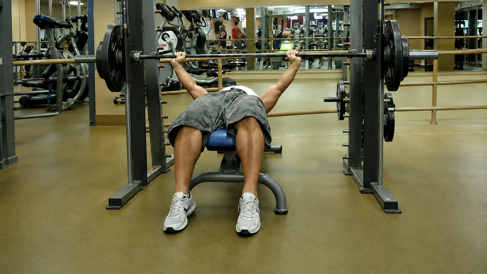 Jason Faulkner performing a decline bench press on a Smith machine