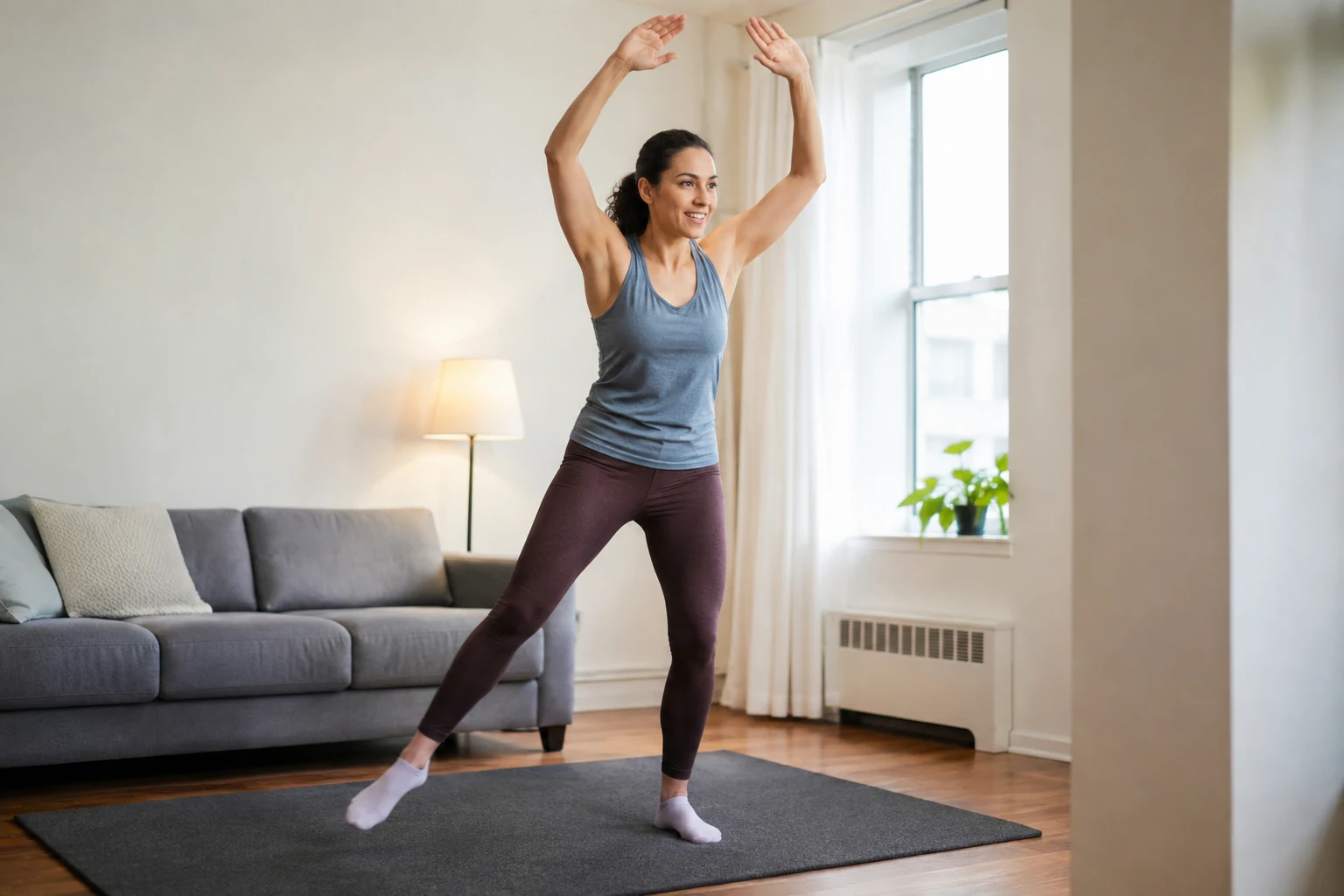 Woman performs a low-impact step jack with one foot grounded on a rug.