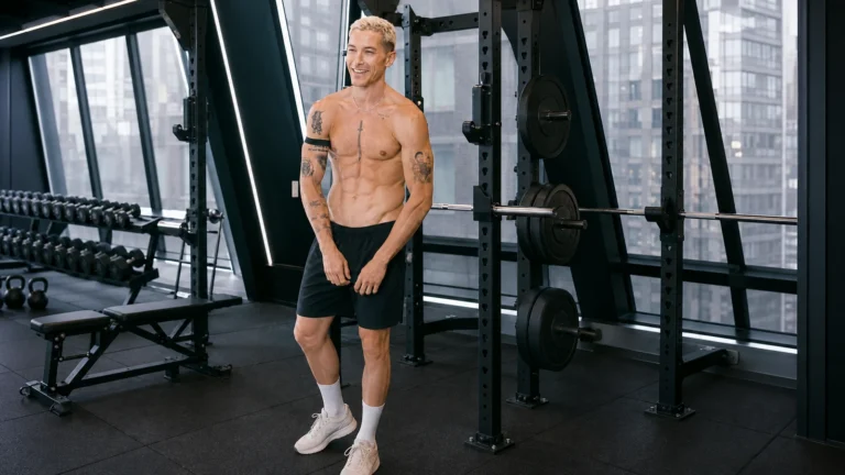 Taz Skylar standing in a modern strength gym